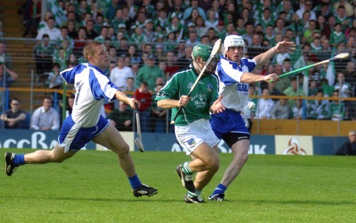 Action from the Waterford v Limerick replay in the 2003 Munster hurling championship. Photo: Sean Byrne